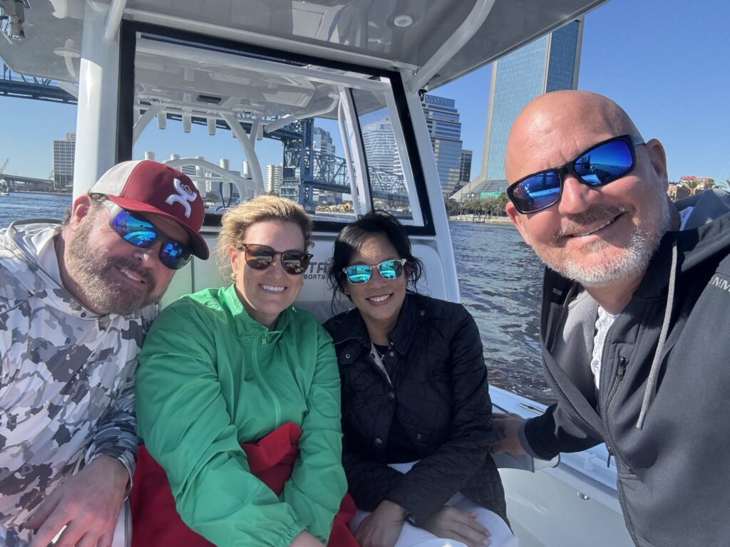 Travis and his wife, Trixie, along with their friends, Jim and Kim. jim and kim thompson trixie travis